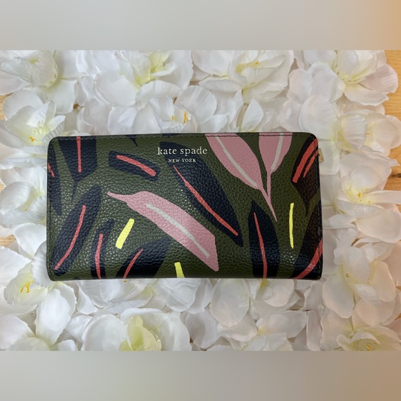 kate spade Handbags - Kate Spade Staci Large Slim Bifold Wallet.
Tropic Leaves